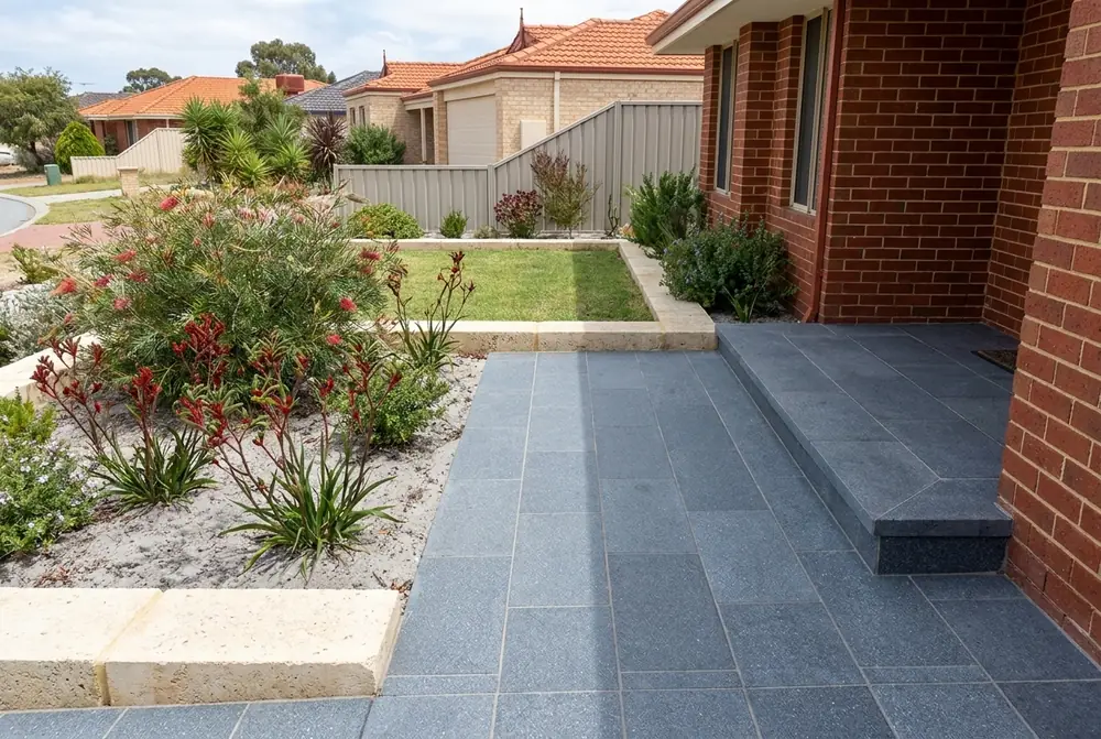 Blue grey bluestone pavers on a front entry path and step