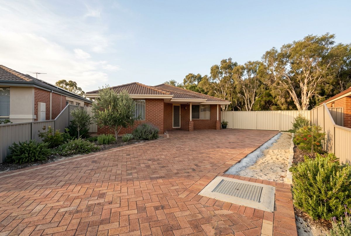 Relaid herringbone driveway at a 1990s home in Canning Vale, Perth by IBP Paving