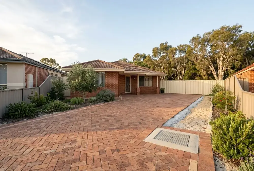 Relaid herringbone driveway at a 1990s home in Canning Vale, Perth by IBP Paving