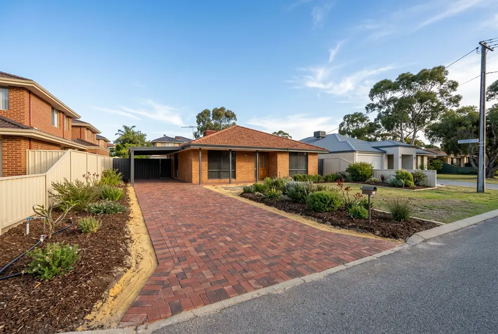 Relaid clay paver driveway on a 1980s Heathridge home over yellow sand
