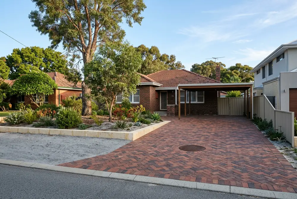 Replaced brick driveway with a flush soakwell lid at a 1960s home in Rossmoyne, Perth