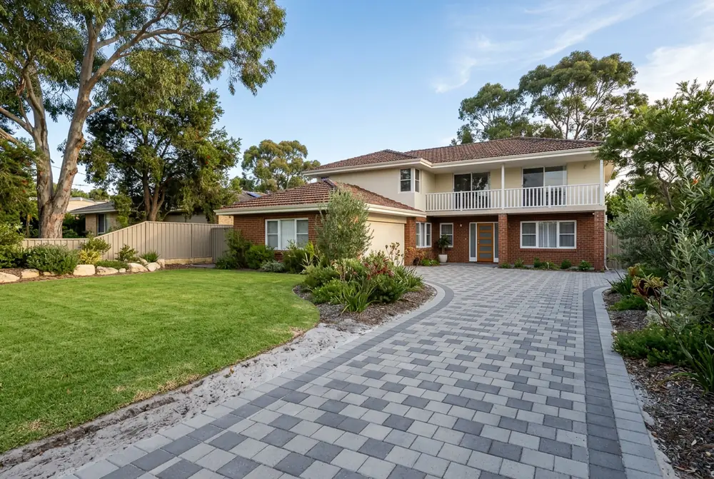 New brick driveway at a 1960s home on light grey sand in Shelley