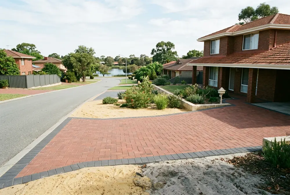Relaid paver driveway at a late 1970s home on yellow sand in Stirling, Perth
