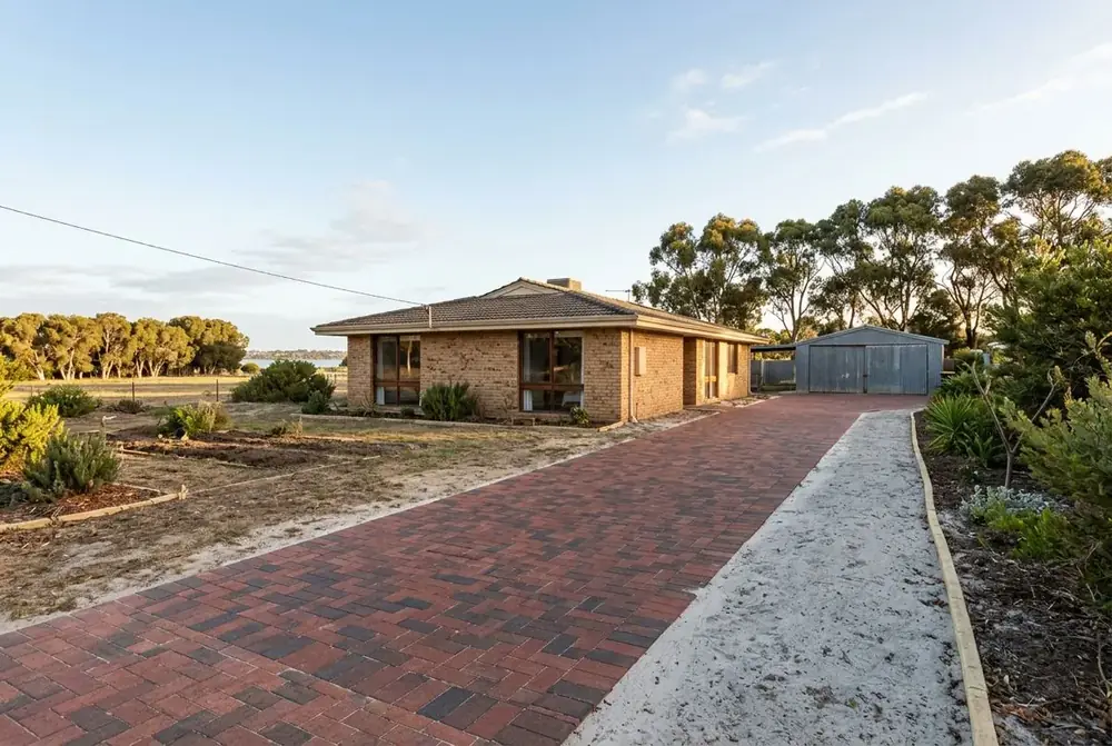 Long paved driveway on grey sand at a rural lot in Wanneroo, Perth by IBP Paving