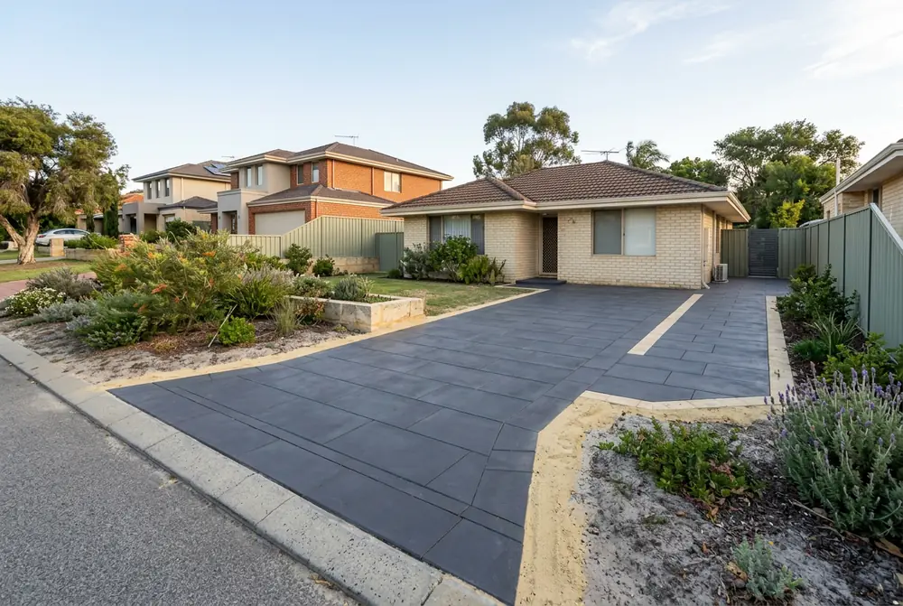 New paver driveway and side path at a 1960s home on light sand in Westminster, Perth