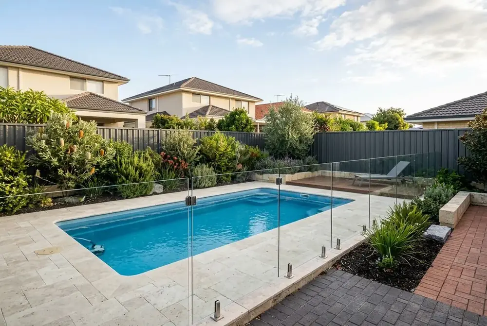 Pool paving in tumbled travertine with bullnose coping in Perth by IBP Paving