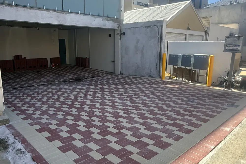 Red and charcoal brick paved driveway at a Perth townhouse by IBP Paving